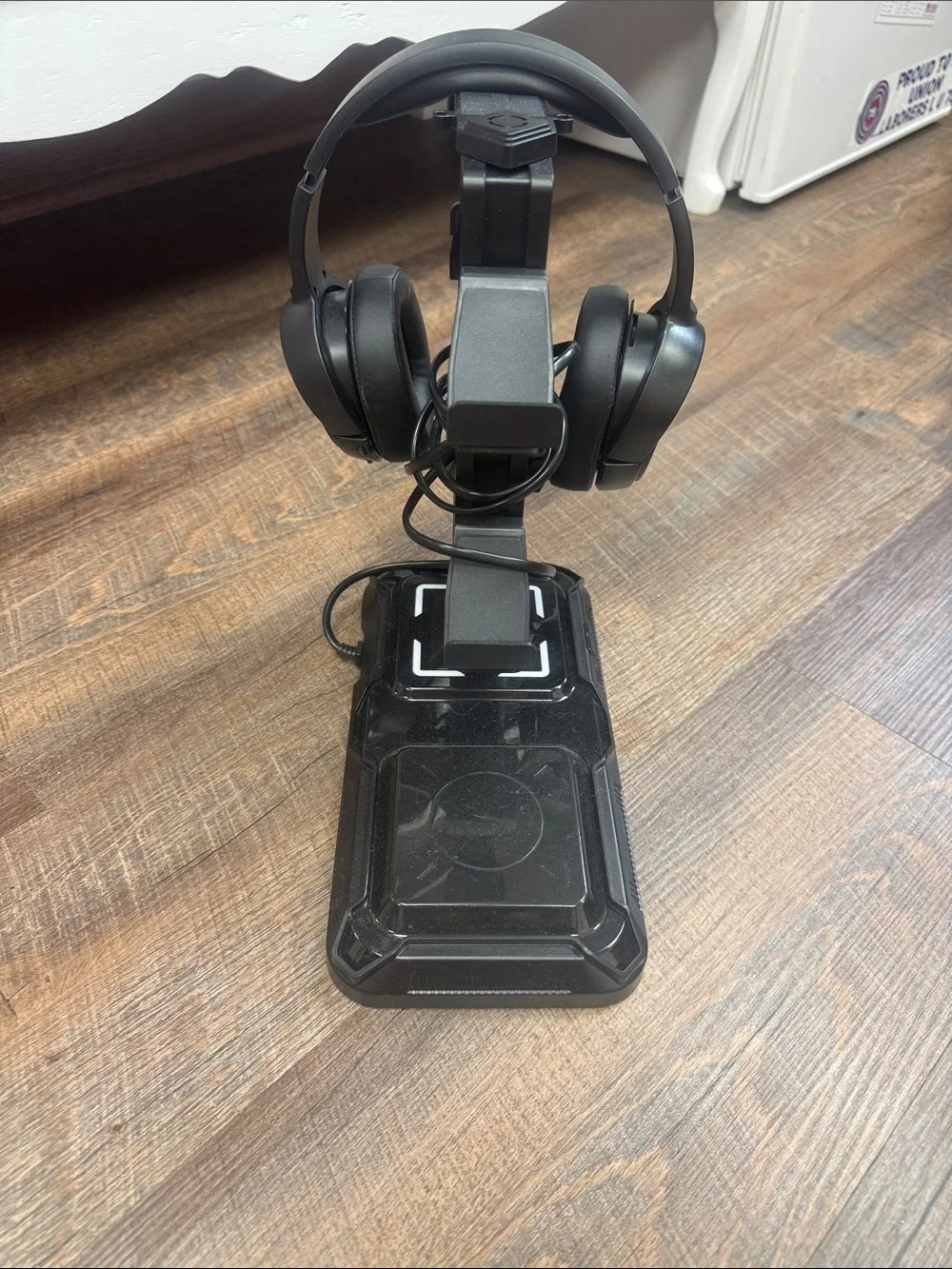 Black Over-Ear Headphones on Stand